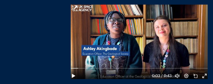 still of a video image with two women smiling